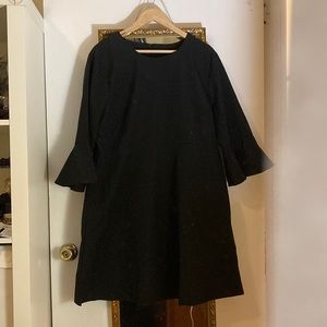 Black dress with flounce sleeves